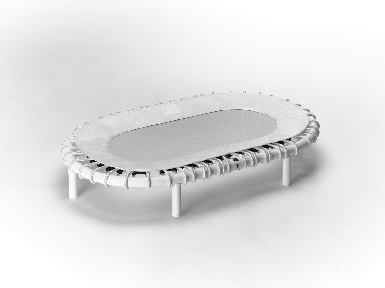 Standpolin in Weiß mit heller Sprungfläche, weißen Seilringen und dezentem Muster auf dem Rand für aktives Stehen, Balance und ergonomische Bewegung.
