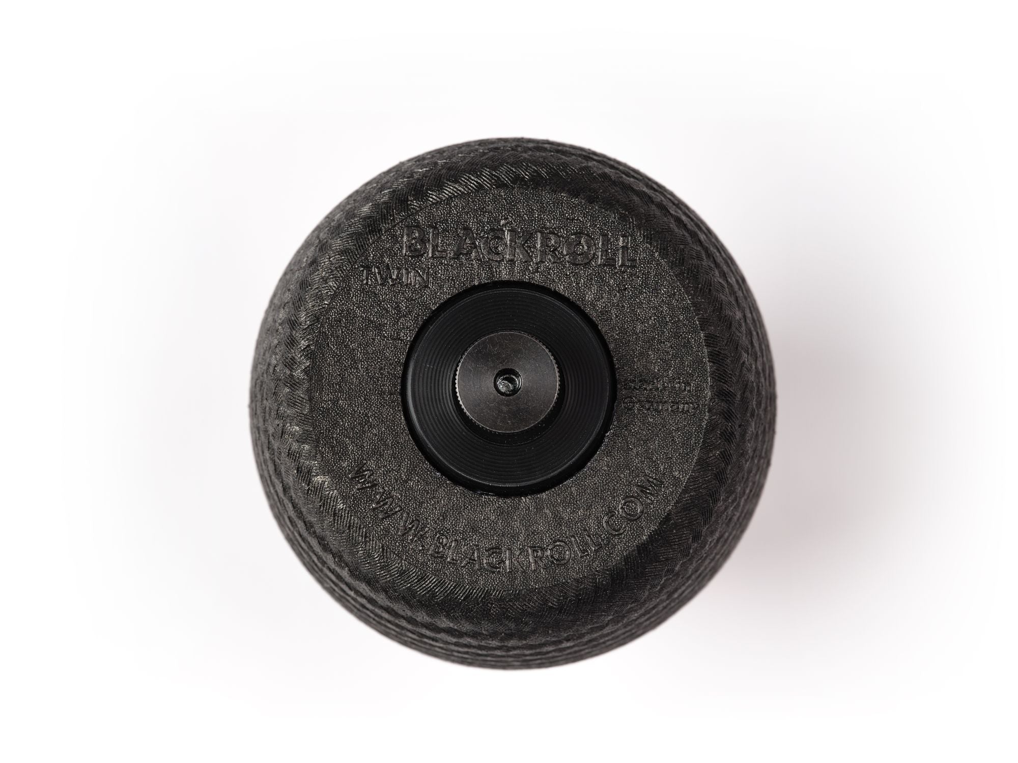 Nahaufnahme der schwarzen Blackroll Twin für Standpolin mit Befestigungselement, strukturierter Oberfläche und robuster Form für Faszienmassage.