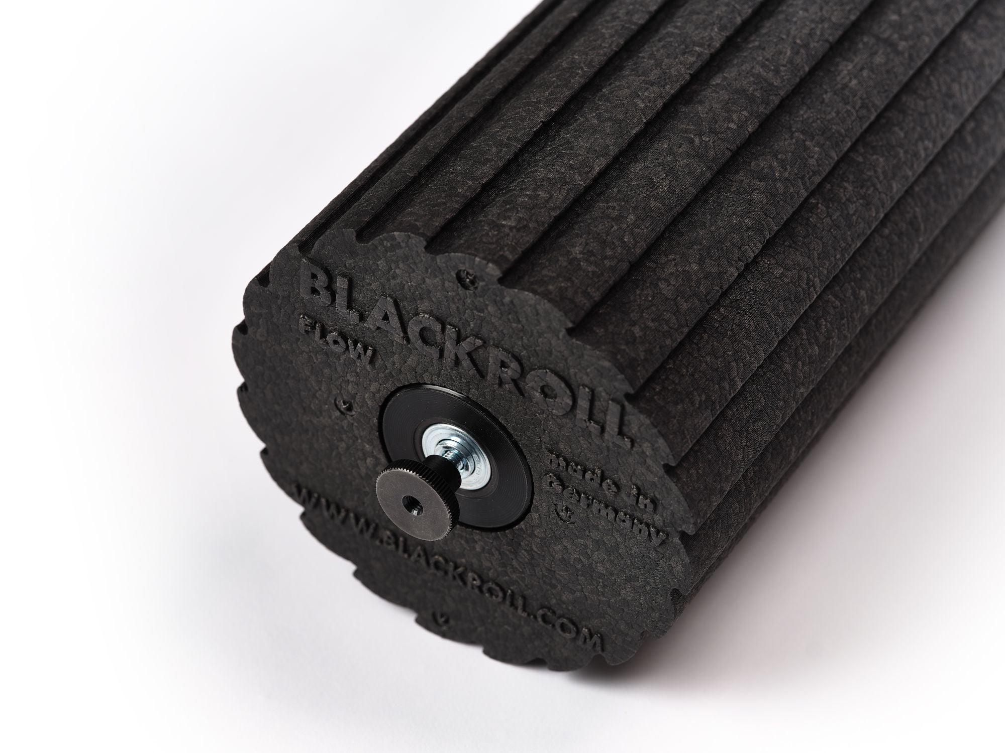Blackroll für Standpolin mit gerillter schwarzer Oberfläche, sichtbarem Befestigungselement und robuster Struktur für Faszienmassage und Regeneration.